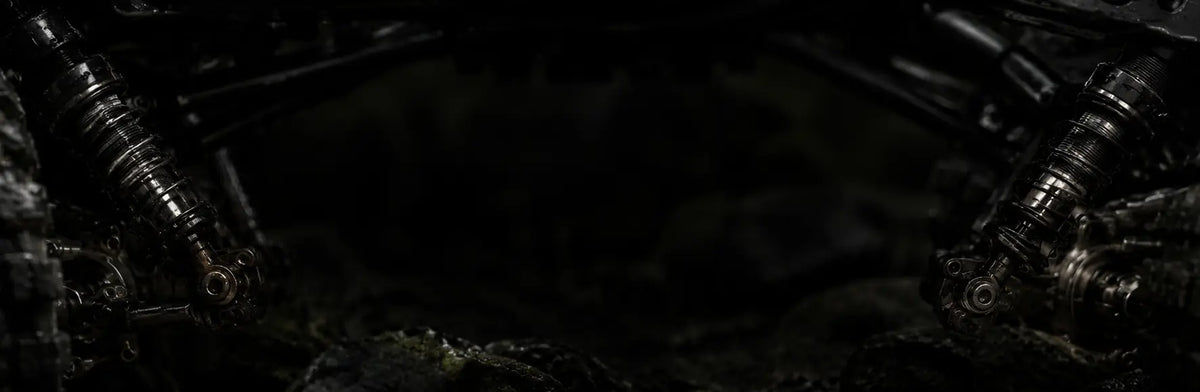 Dark RC crawler suspension and chassis background